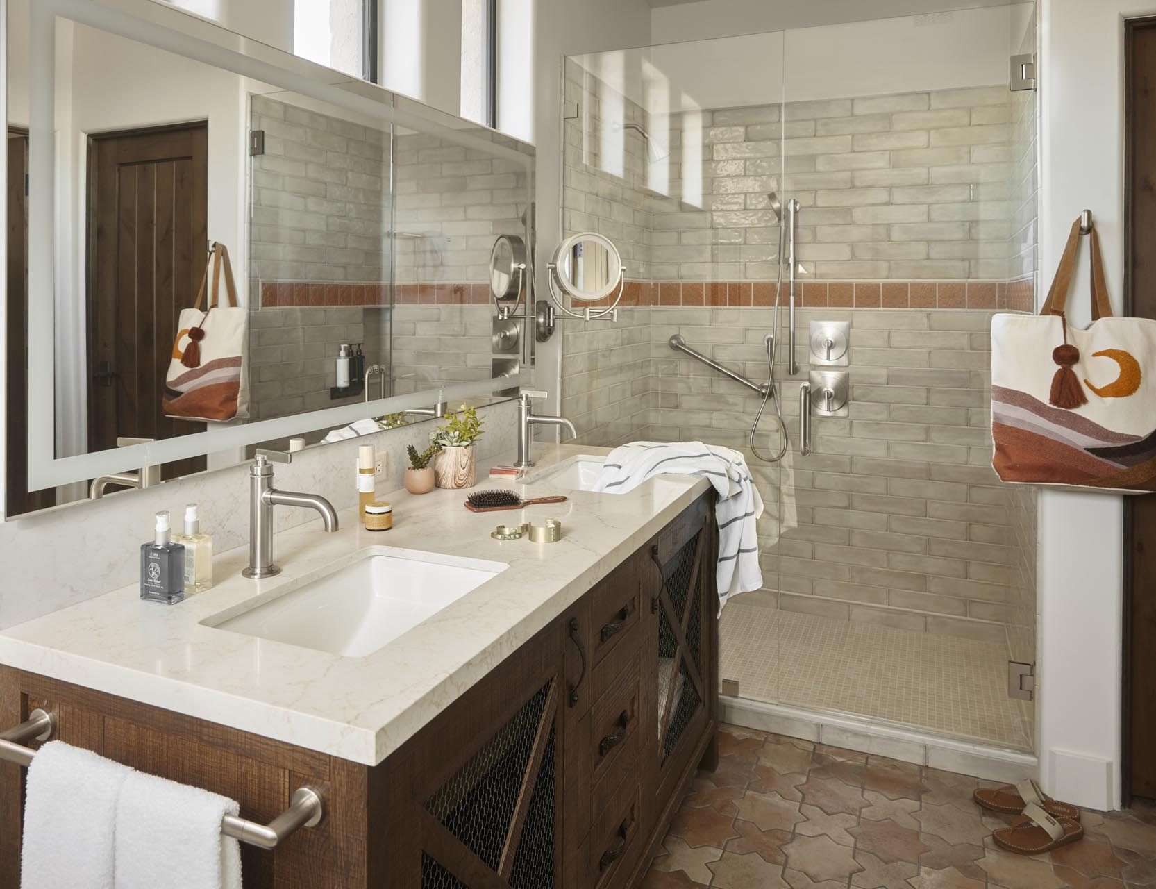 Guest bathroom with double sink and shower